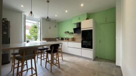 Vente
Appartement rénové de 53 m² + mezzanine, garage et 2 stationnements privatifs