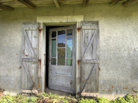 Vente
Fermette à rénover avec grange et garage sur un
