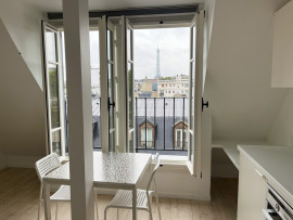 Location
Charmant Studio avec Vue sur la Tour Eiffel à La Muette, Paris 16ème (loyer tout inclus)