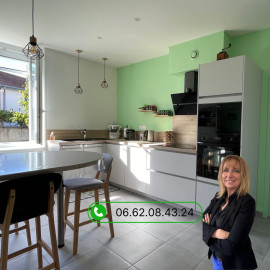 APPARTEMENT RENOVE DE 53 M² + MEZZANINE, GARAGE ET 2 STATIONNEMENTS PRIVATIFS Toussieu